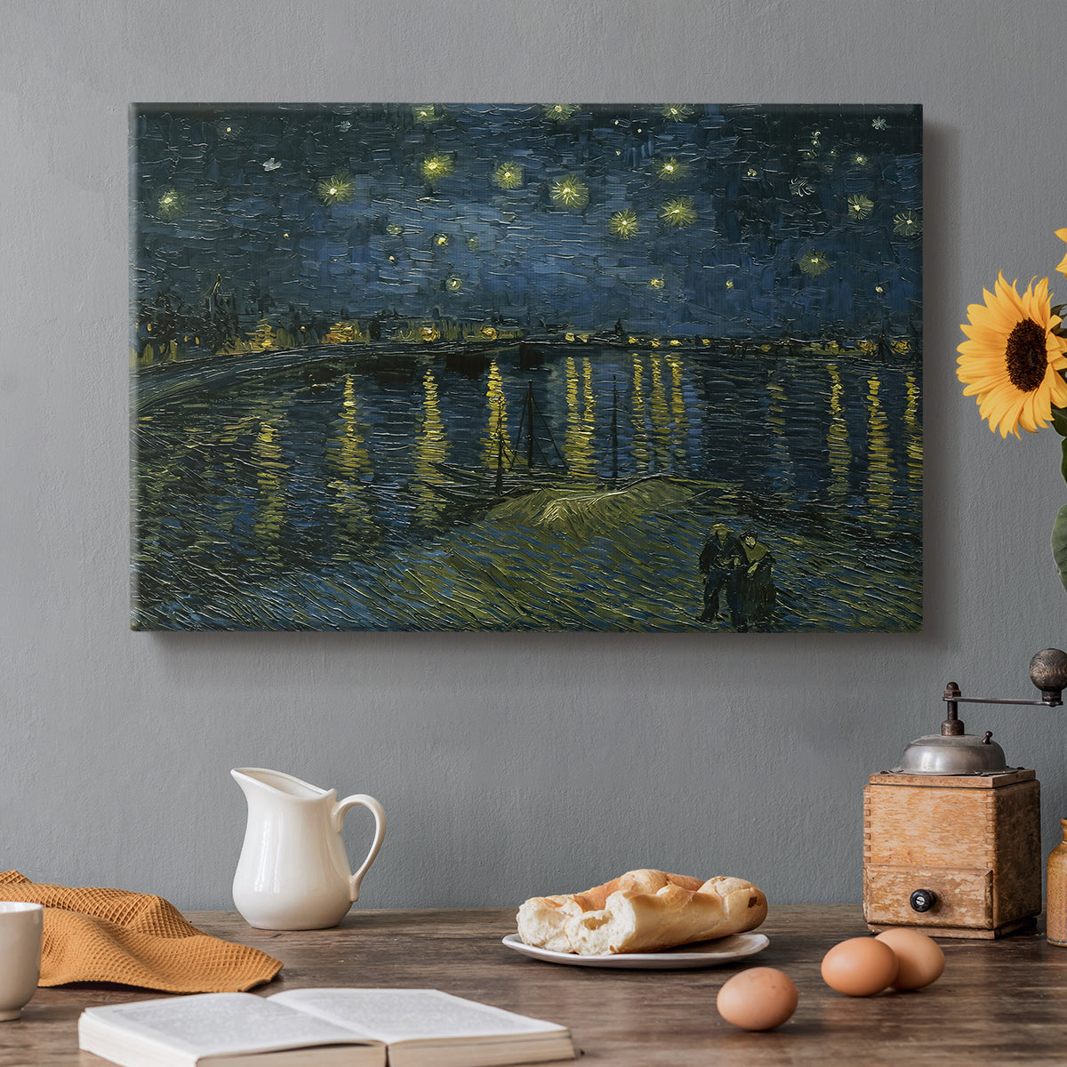 Canvas art print featuring a night river scene with reflections of lights and stars across water, set in a cozy kitchen setting