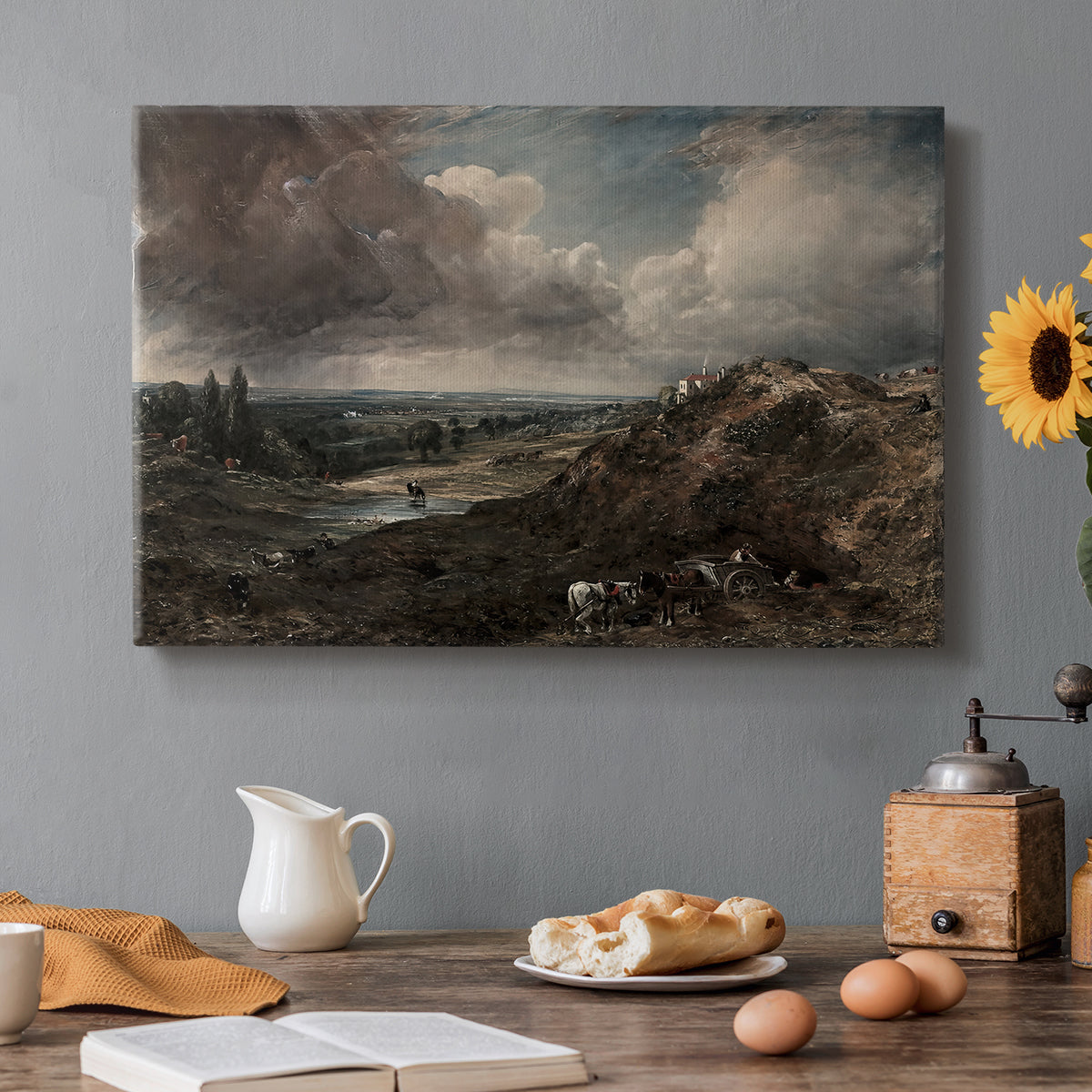 Canvas art print featuring a pond surrounded by trees under open sky, set in a cozy kitchen setting