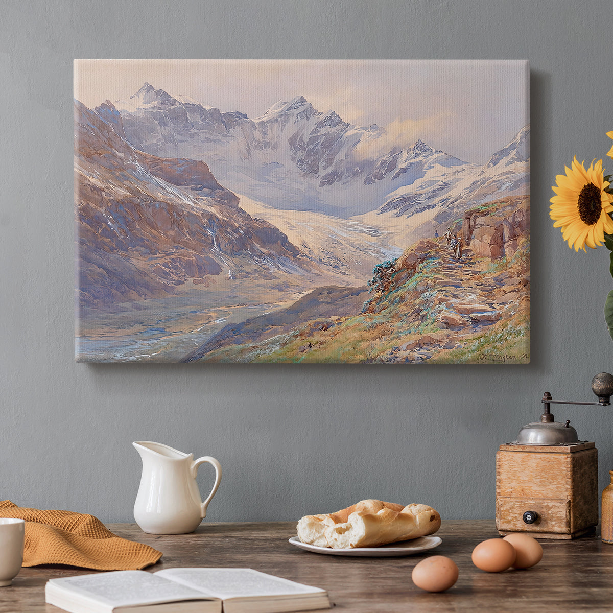 Canvas art print featuring an alpine glacier landscape with rugged peaks and snow-covered terrain, set in a cozy kitchen setting