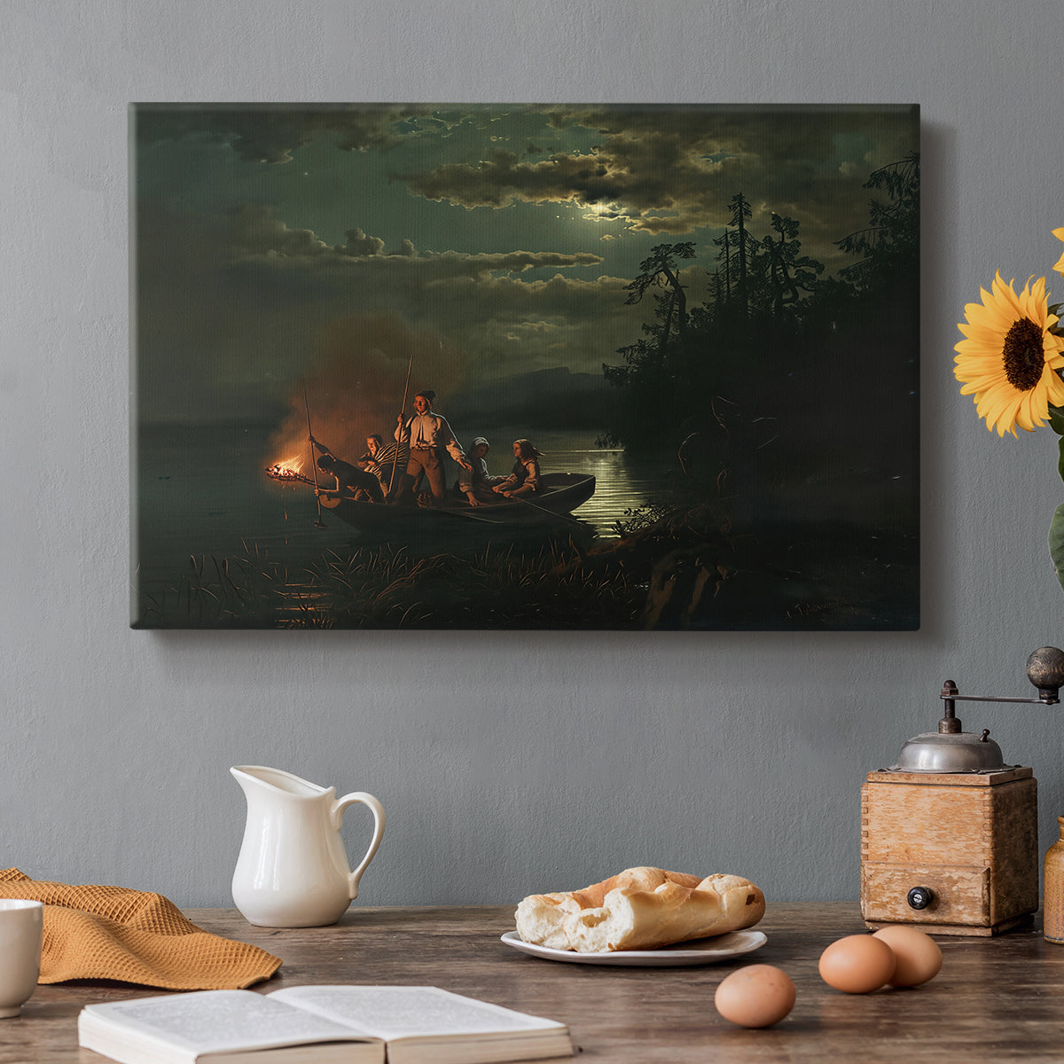 Canvas art print featuring figures fishing with spears from boat on calm lake at dusk, set in a cozy kitchen setting