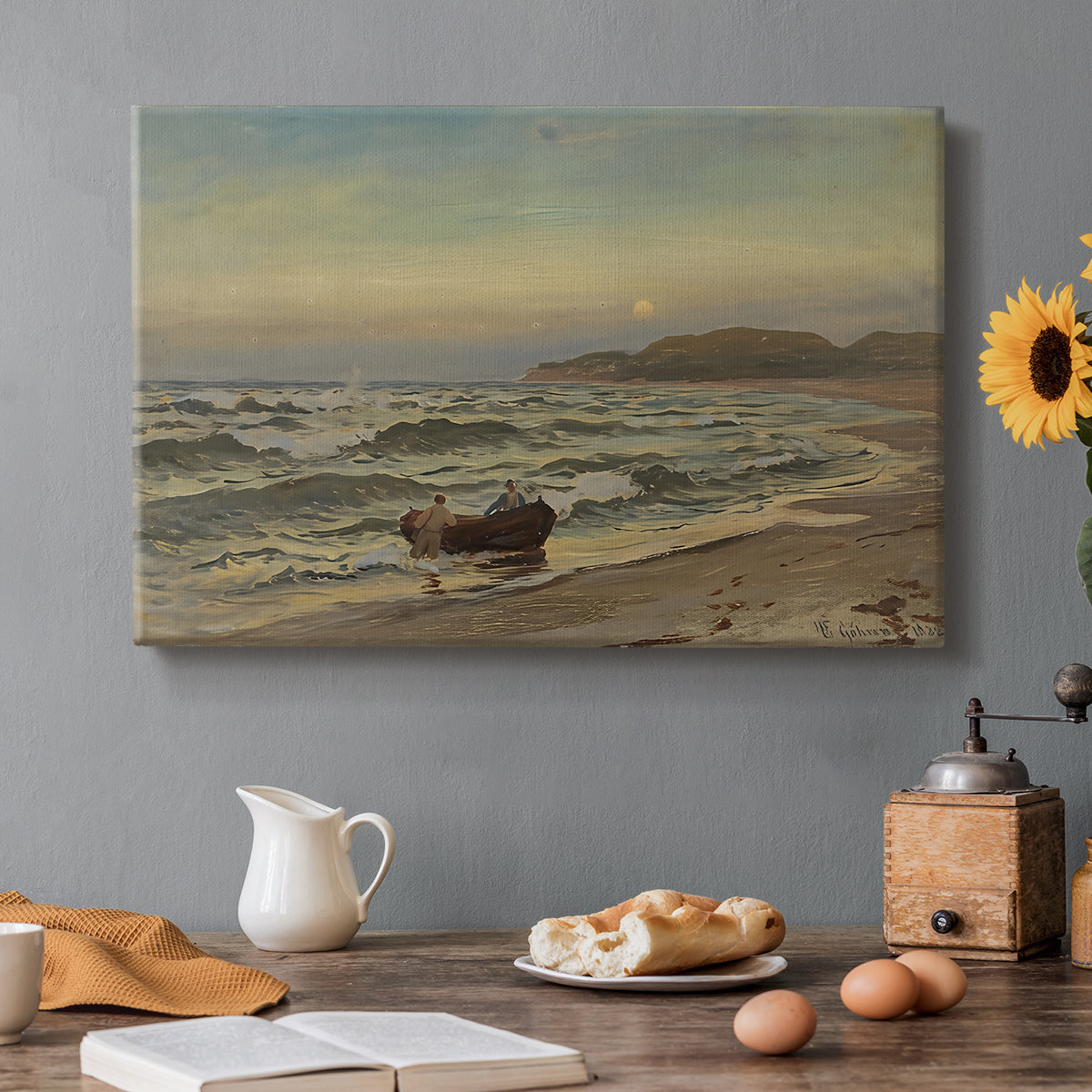Canvas art print featuring a stormy coastal scene with waves crashing under dark dramatic sky, set in a cozy kitchen setting