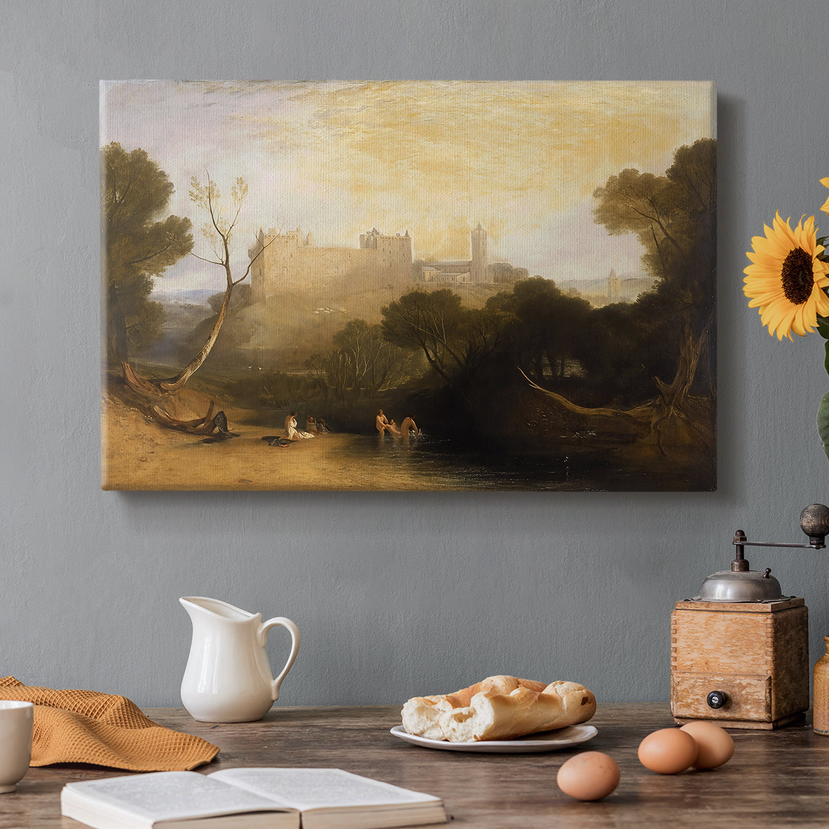 Canvas art print featuring a historic palace set within landscape with water and surrounding terrain, set in a cozy kitchen setting