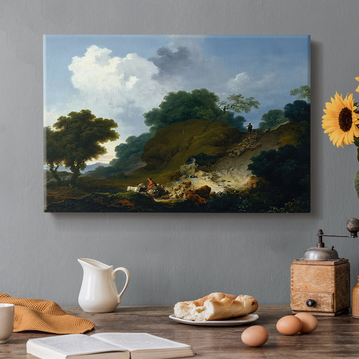 Canvas art print featuring shepherds tending flock of sheep in open pastoral landscape, set in a cozy kitchen setting