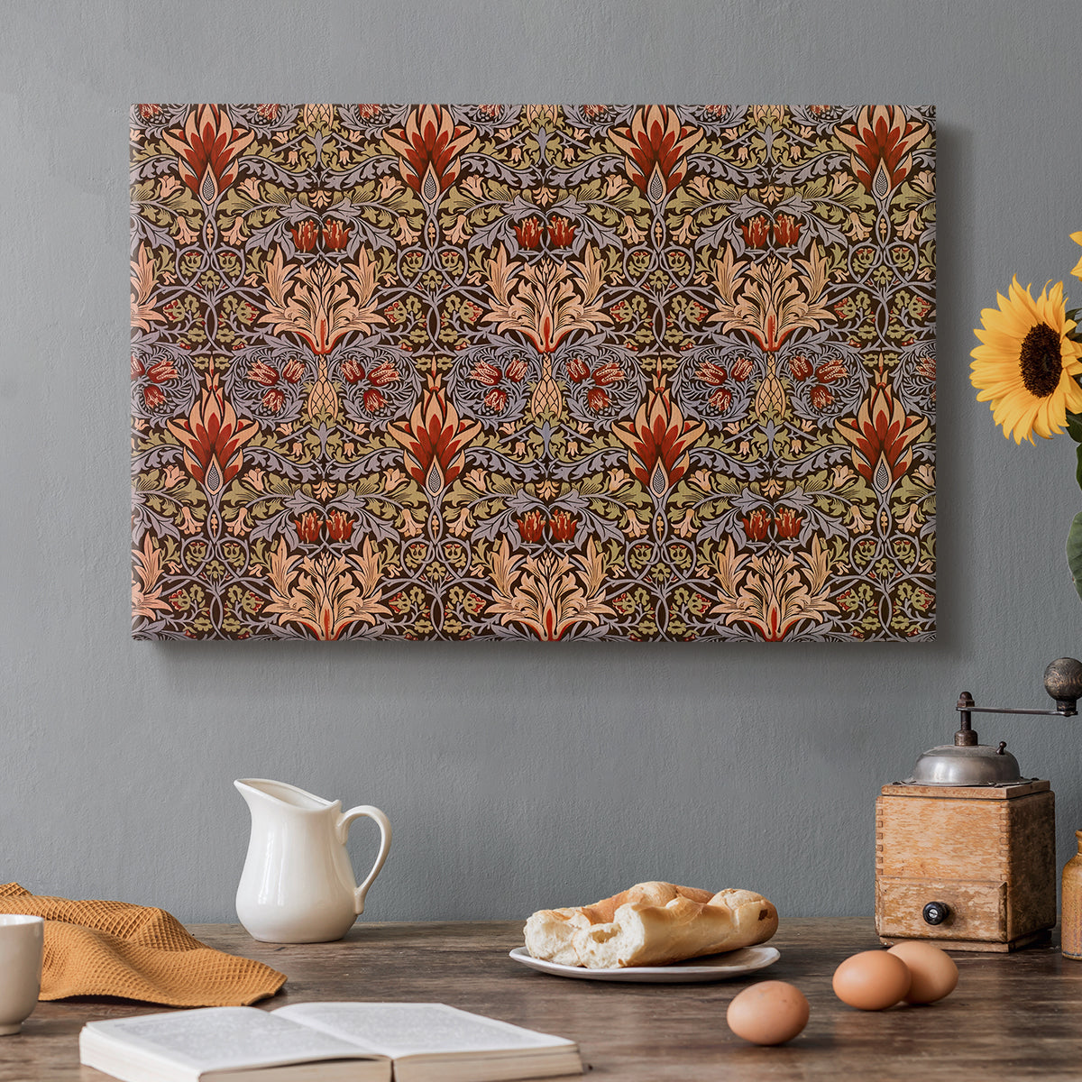 Canvas art print featuring a repeating pattern of stylized flowers with warm red tones and curved stems, set in a cozy kitchen setting