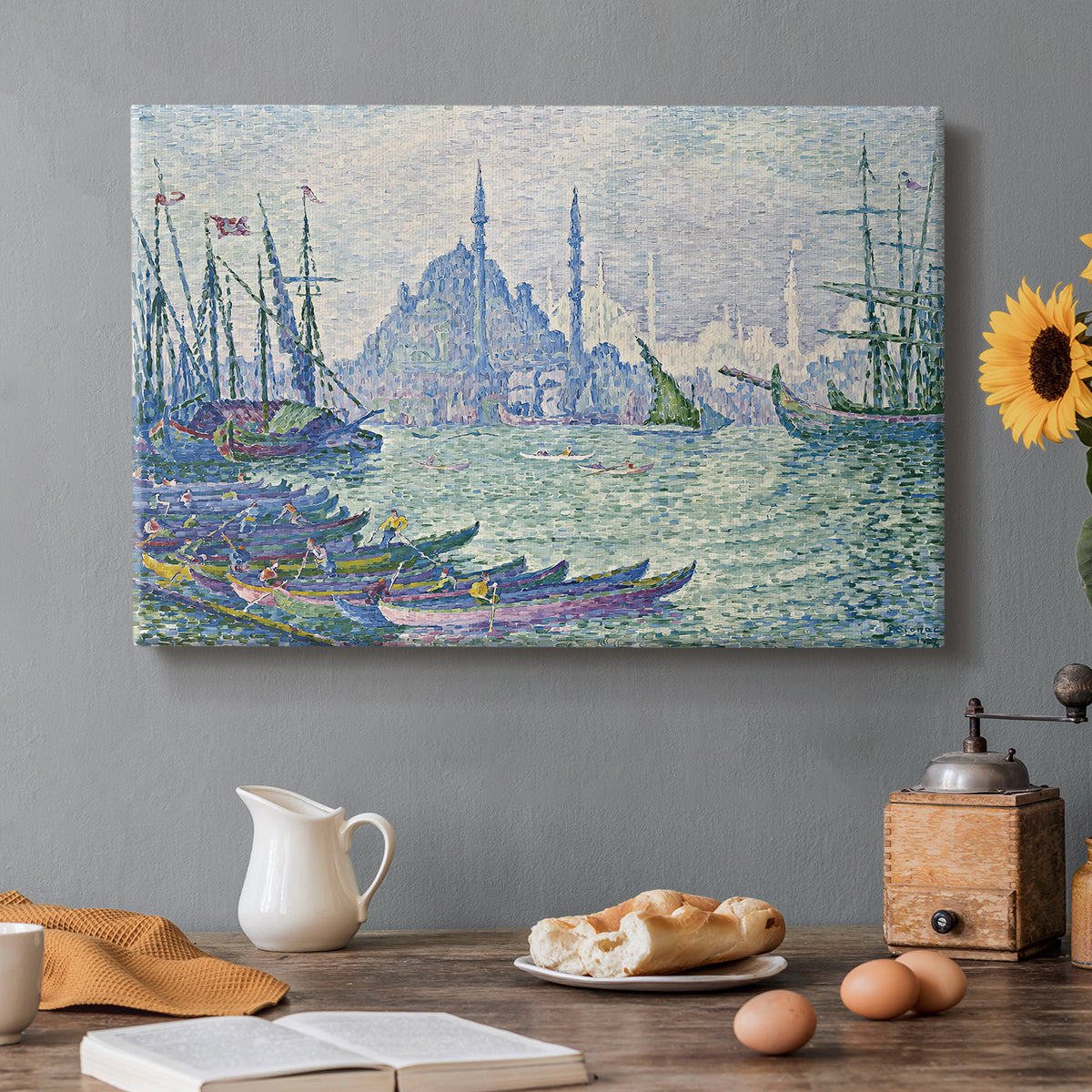Canvas art print featuring a skyline with minarets rising above waterfront and boats, set in a cozy kitchen setting