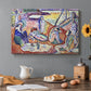 Canvas art print featuring figures lounging outdoors in a vibrant coastal setting with water views, set in a cozy kitchen setting