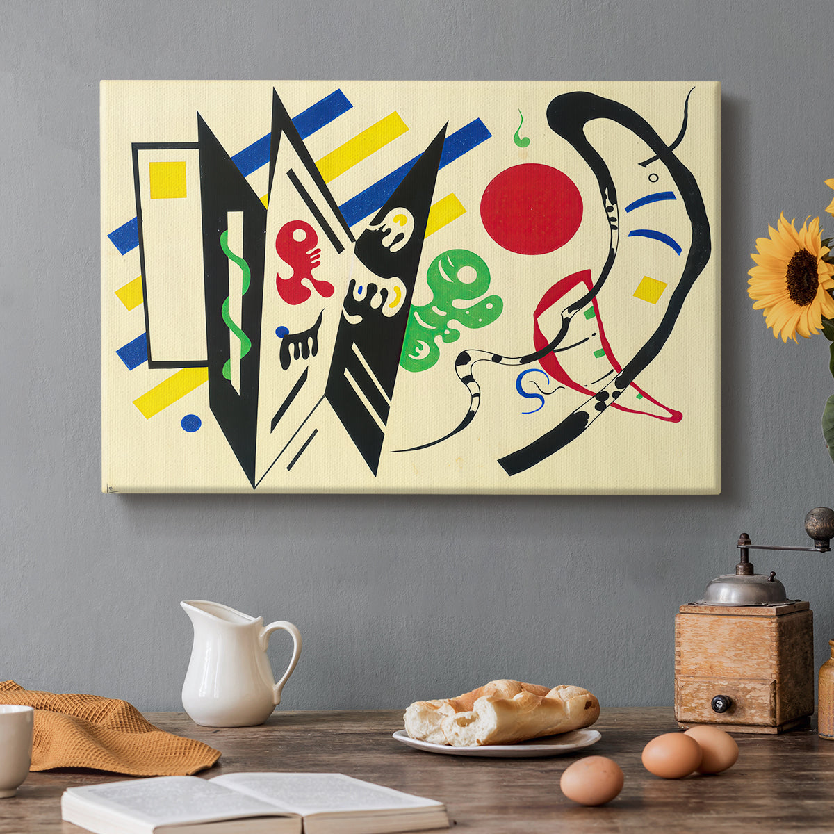 Canvas art print featuring an abstract composition of geometric shapes and lines arranged in balanced layout, set in a cozy kitchen setting