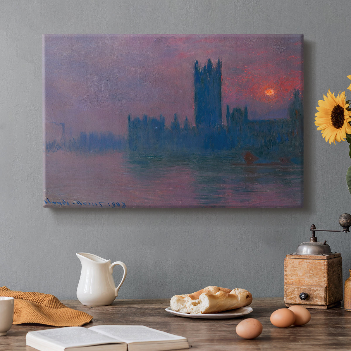 Canvas art print featuring a silhouette of Parliament buildings against glowing sunset across river, set in a cozy kitchen setting