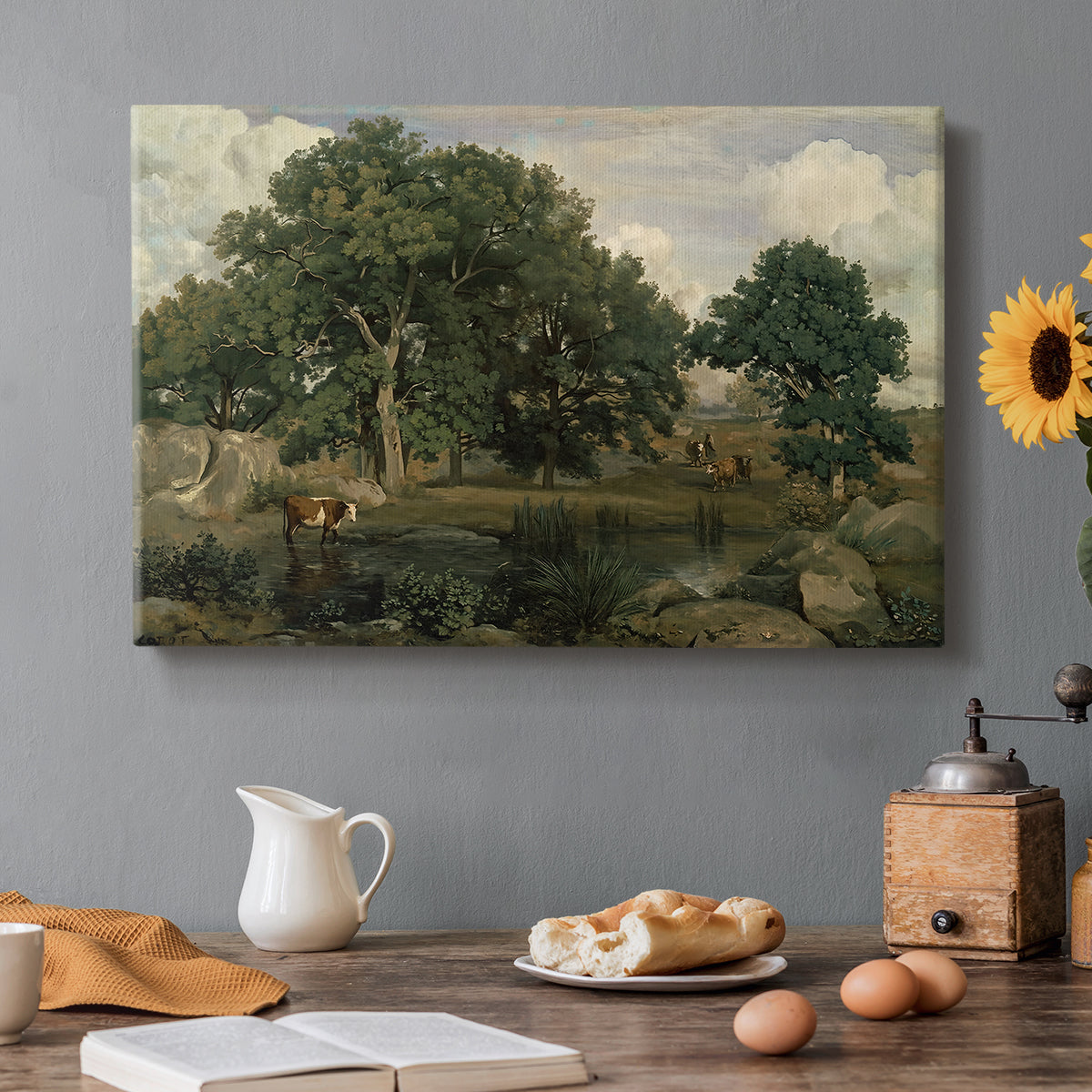 Canvas art print featuring a dense forest landscape with trees and filtered light across ground, set in a cozy kitchen setting