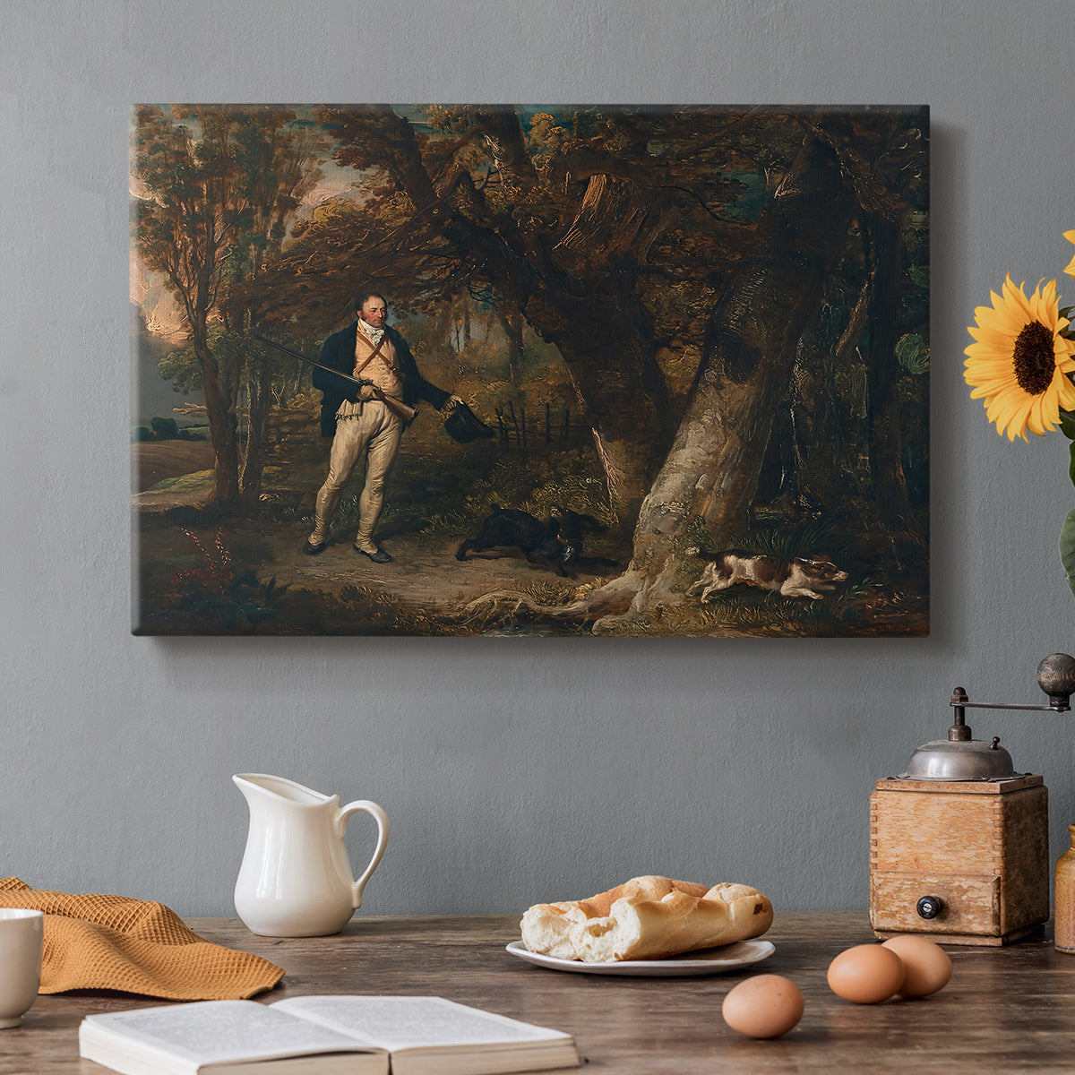 Canvas art print featuring a man with multiple dogs preparing for hunting in countryside, set in a cozy kitchen setting