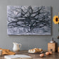 Canvas art print featuring a branching tree reduced to dark lines, set in a cozy kitchen setting