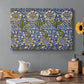 Canvas art print featuring a repeating pattern of birds and plants intertwined in dense decorative layout, set in a cozy kitchen setting