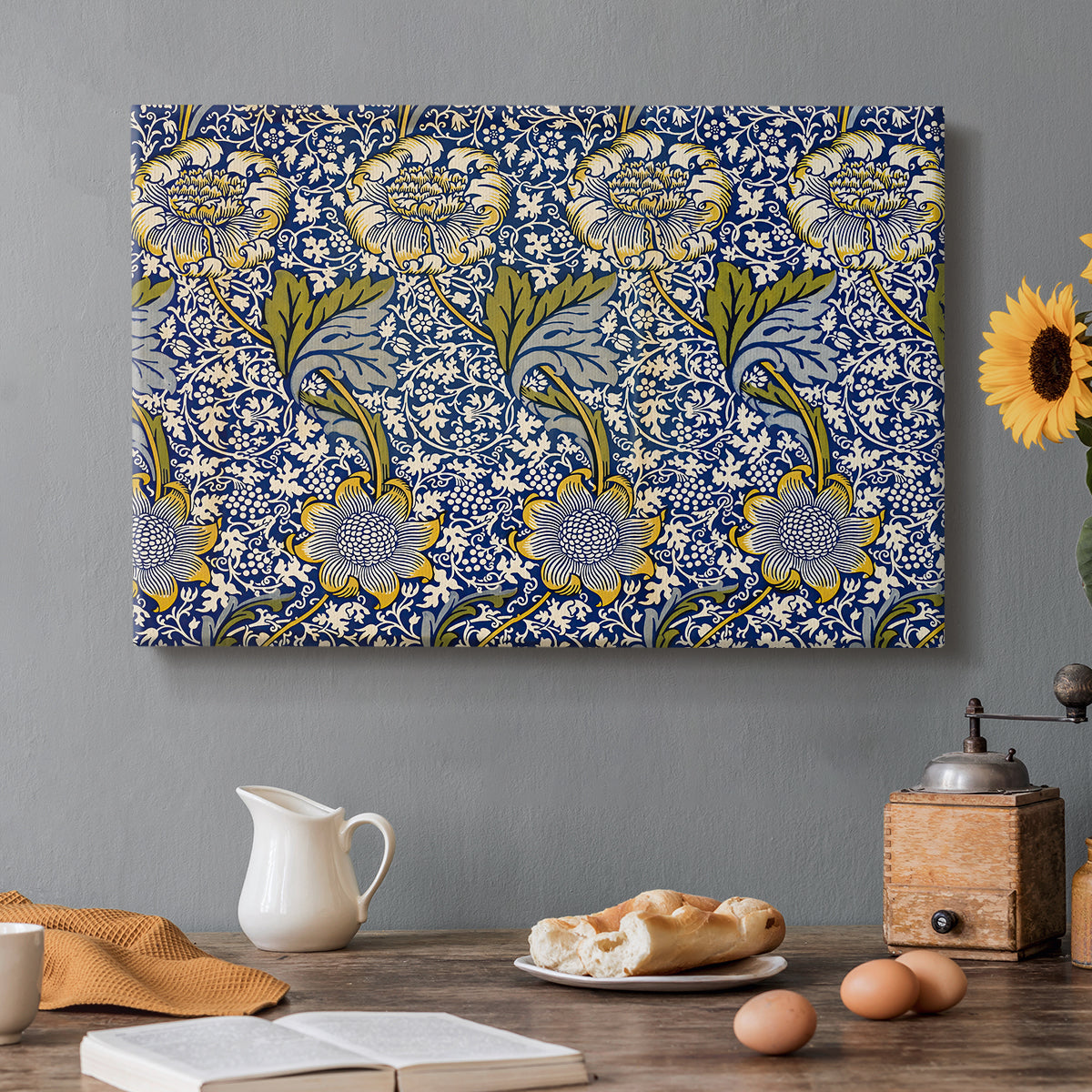 Canvas art print featuring a repeating pattern of birds and plants intertwined in dense decorative layout, set in a cozy kitchen setting