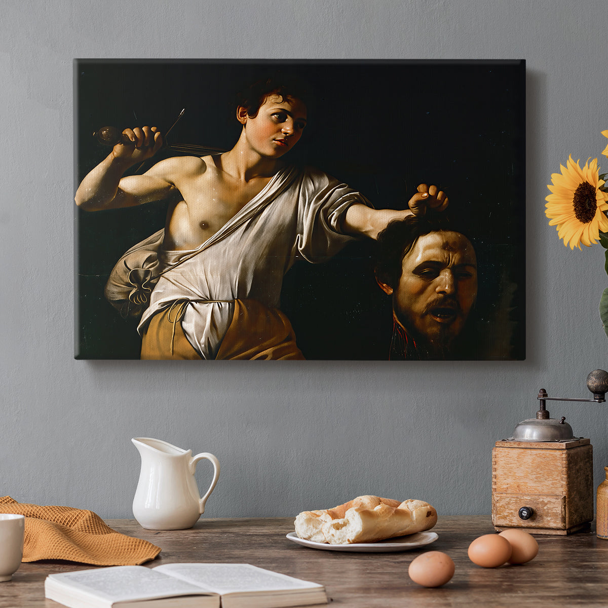 Canvas art print featuring a young David holding the severed head of Goliath against a dark background, set in a cozy kitchen setting