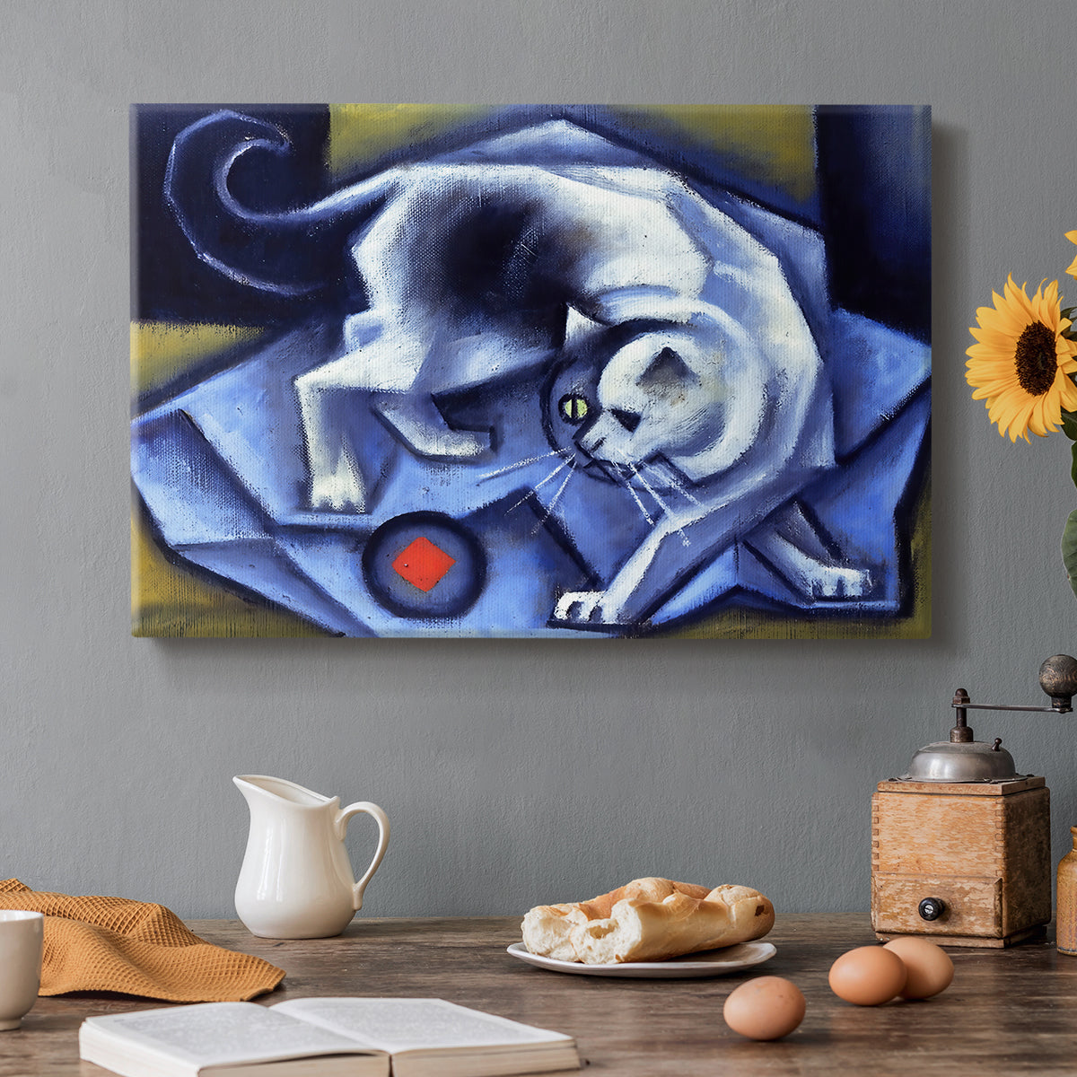 Canvas art print featuring a geometric cat interacting with ball in cubist composition, set in a cozy kitchen setting