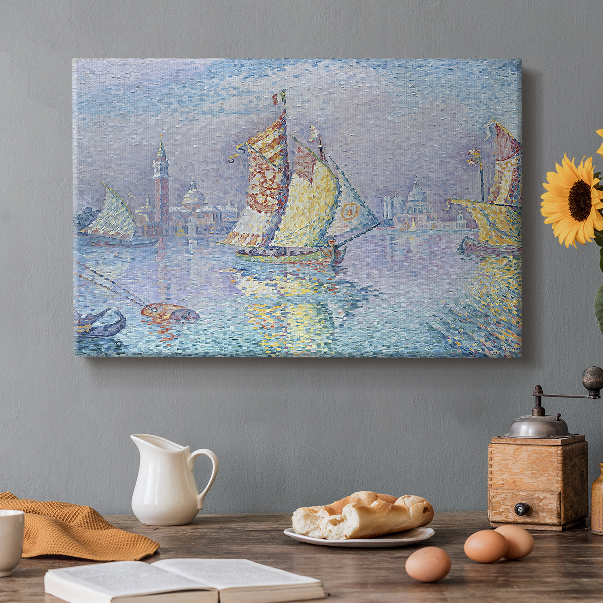 Canvas art print featuring a boat with yellow sail on water, set in a cozy kitchen setting