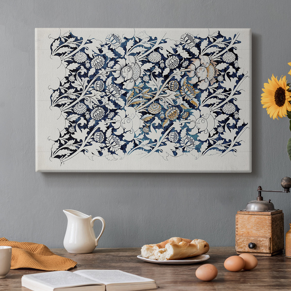 Canvas art print featuring a repeating floral design with flowing stems and scattered blossoms across light background, set in a cozy kitchen setting