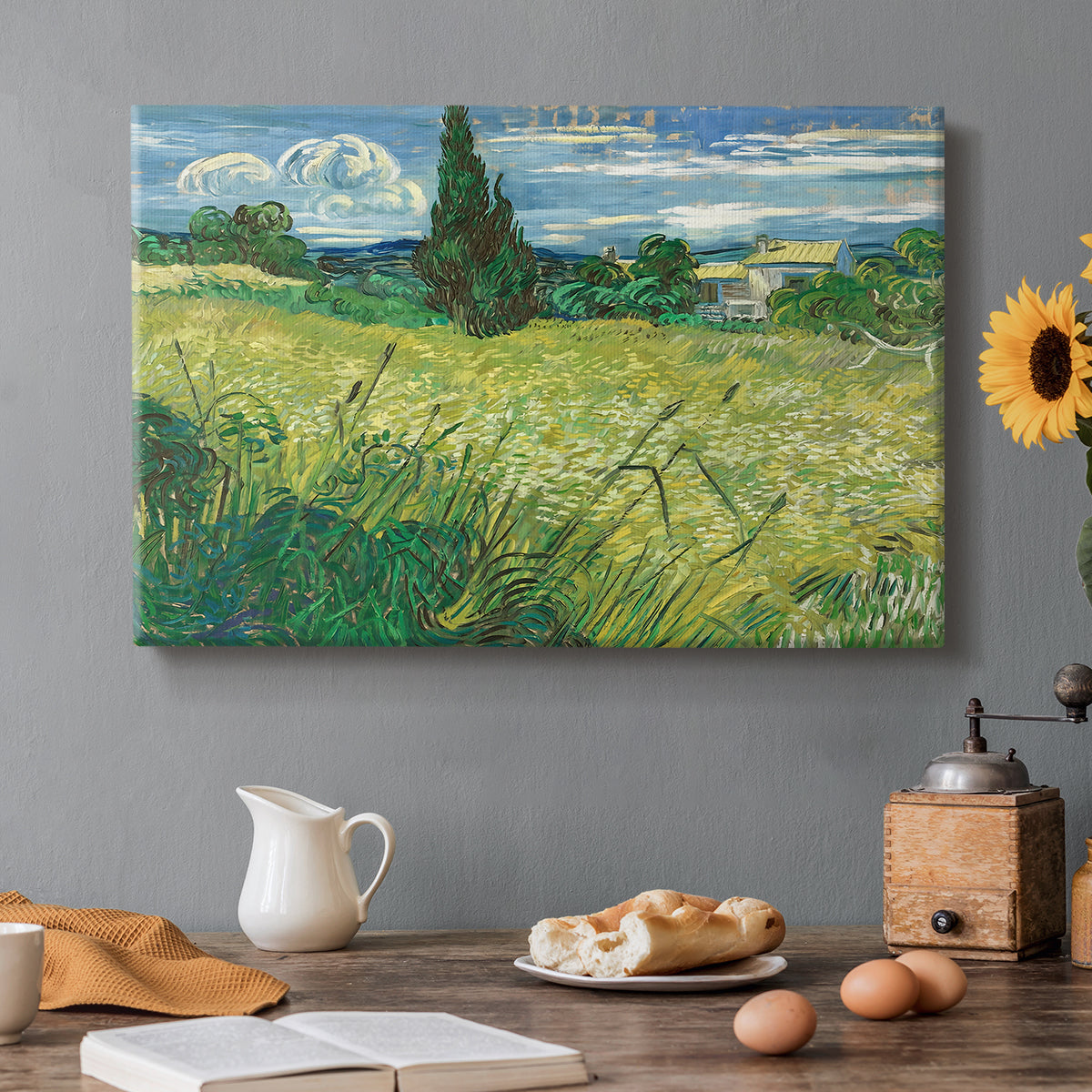 Canvas art print featuring a wheat field with tall cypress tree rising against vivid sky, set in a cozy kitchen setting