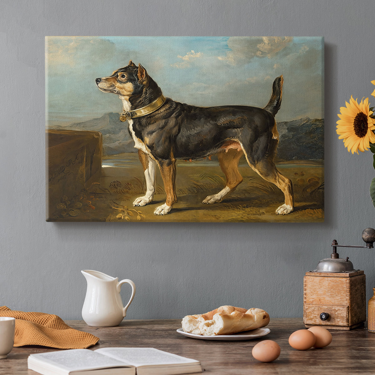 Canvas art print featuring a small terrier standing alert in open countryside landscape, set in a cozy kitchen setting