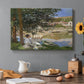 Canvas art print featuring a woman and child seated along riverbank beneath trees in soft daylight, set in a cozy kitchen setting