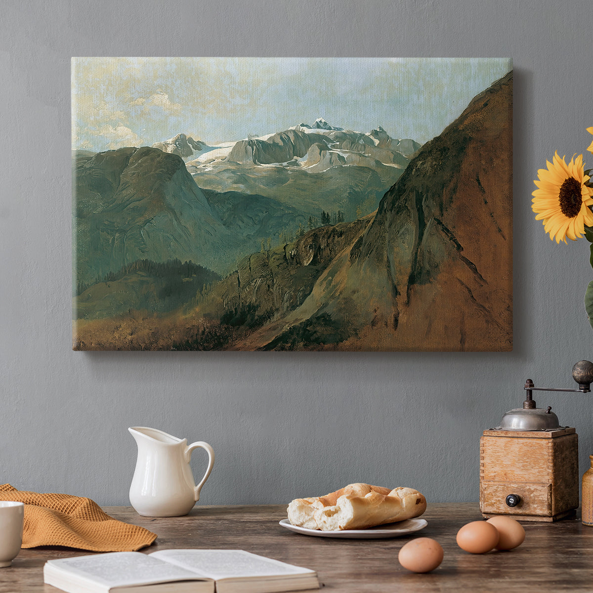 Canvas art print featuring dramatic mountain peaks in expansive landscape, set in a cozy kitchen setting