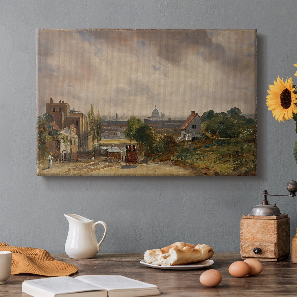 Canvas art print featuring a small cottage among trees in rural setting, set in a cozy kitchen setting