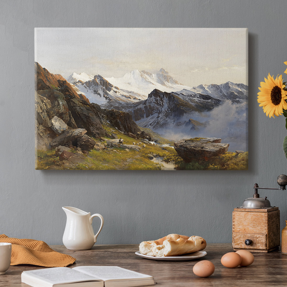 Canvas art print featuring a view of Großglockner peak from alpine hut overlooking valley, set in a cozy kitchen setting