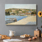 Canvas art print featuring a riverside with buildings and flowing water, set in a cozy kitchen setting