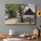 Canvas art print featuring a woman and milkman standing along village street with houses nearby, set in a cozy kitchen setting