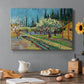 Canvas art print featuring rows of flowering trees enclosed by tall cypress trees in orchard setting, set in a cozy kitchen setting