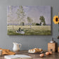 Canvas art print featuring a woman seated in grassy field beneath tree in bright summer landscape, set in a cozy kitchen setting