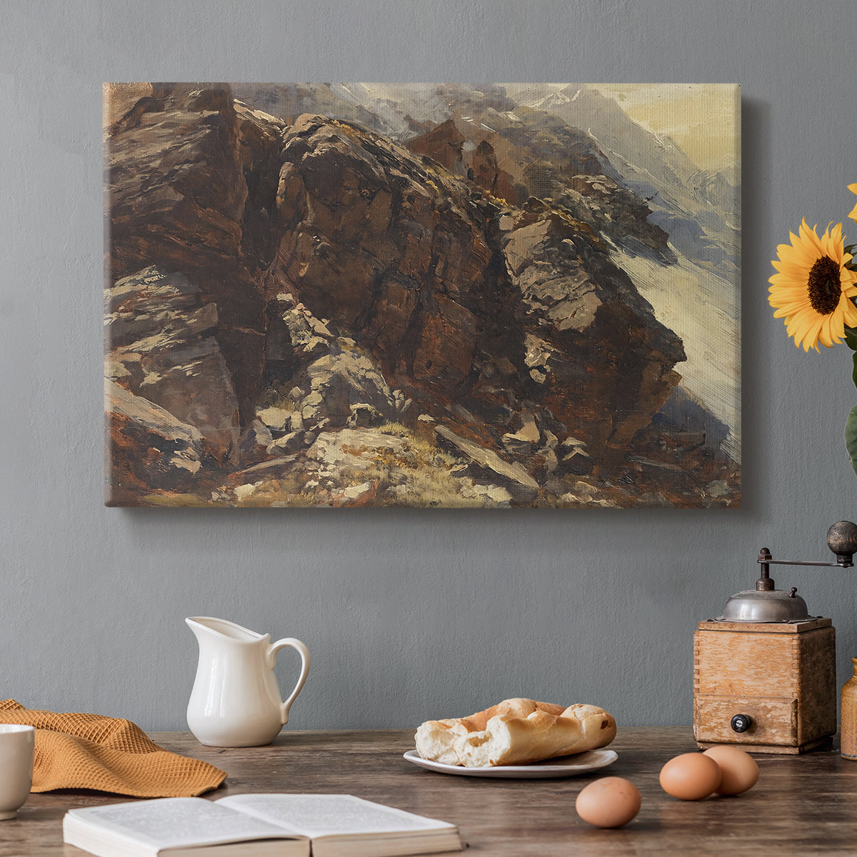 Canvas art print featuring a rocky alpine terrain with steep slopes and distant mountain peaks, set in a cozy kitchen setting