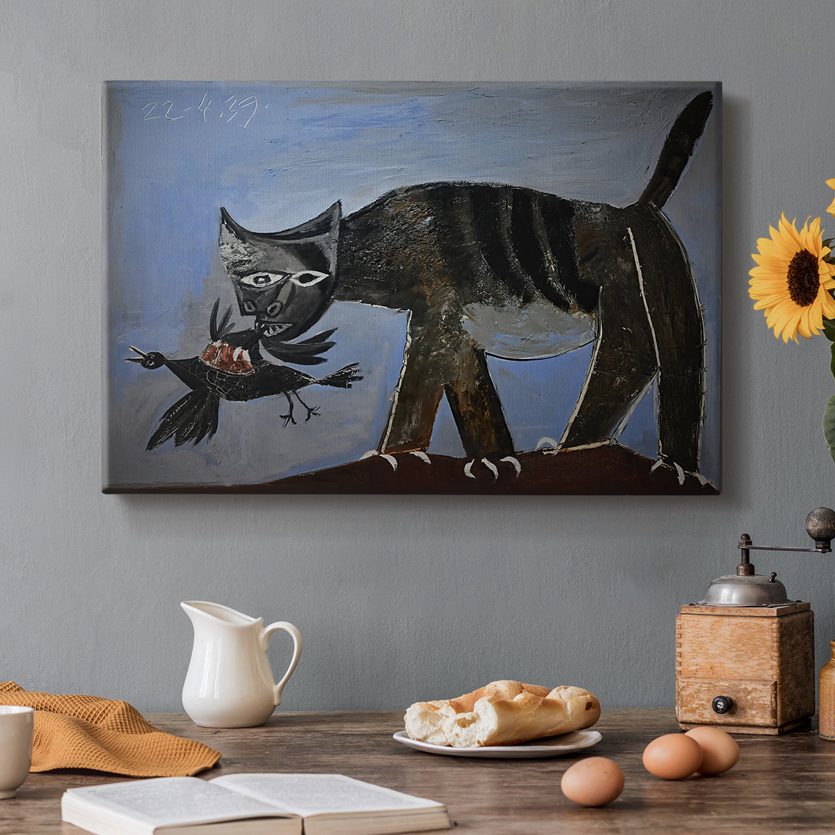 Canvas art print featuring an abstract cat lunging toward bird in angular form, set in a cozy kitchen setting