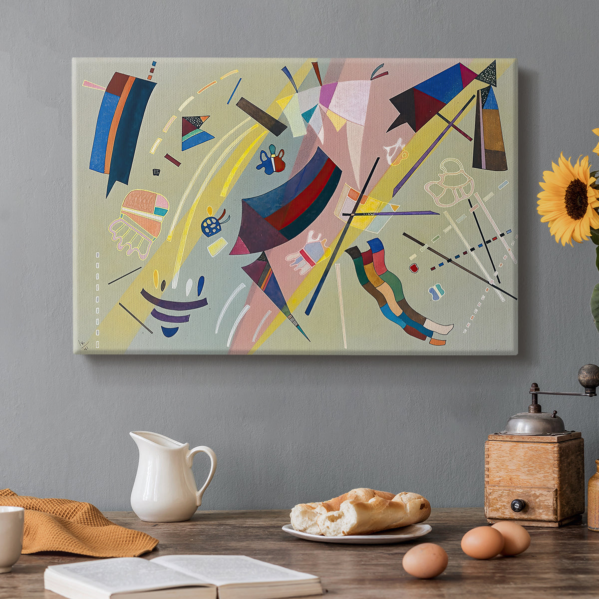 Canvas art print featuring a geometric abstract composition with intersecting lines and floating shapes, set in a cozy kitchen setting