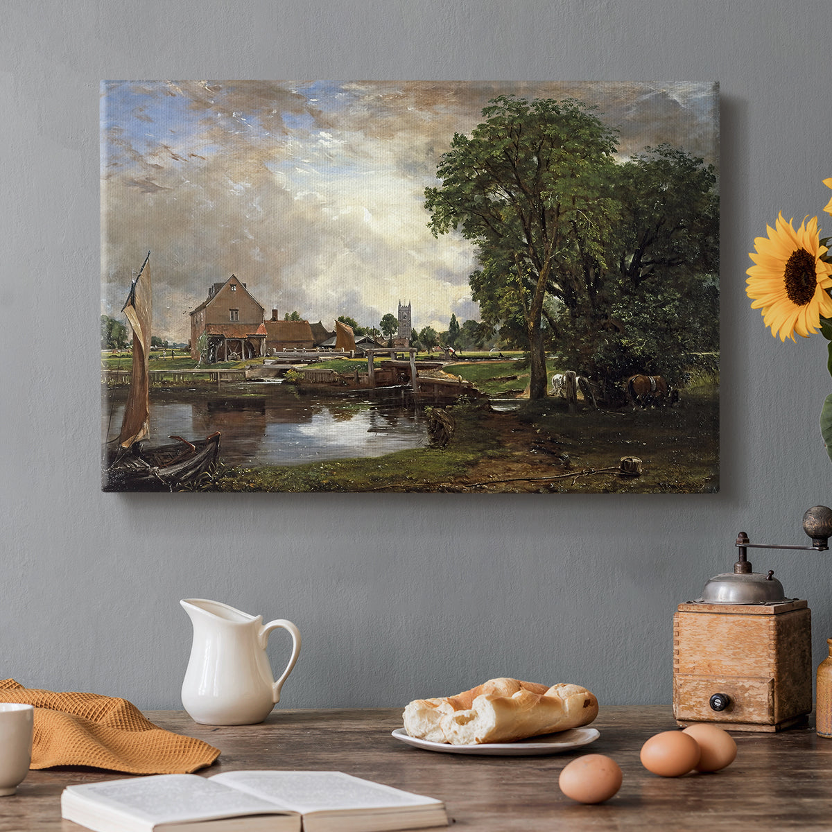 Canvas art print featuring a watermill and lock beside river with trees, set in a cozy kitchen setting