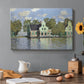 Canvas art print featuring a row of houses along river with reflections in calm water, set in a cozy kitchen setting
