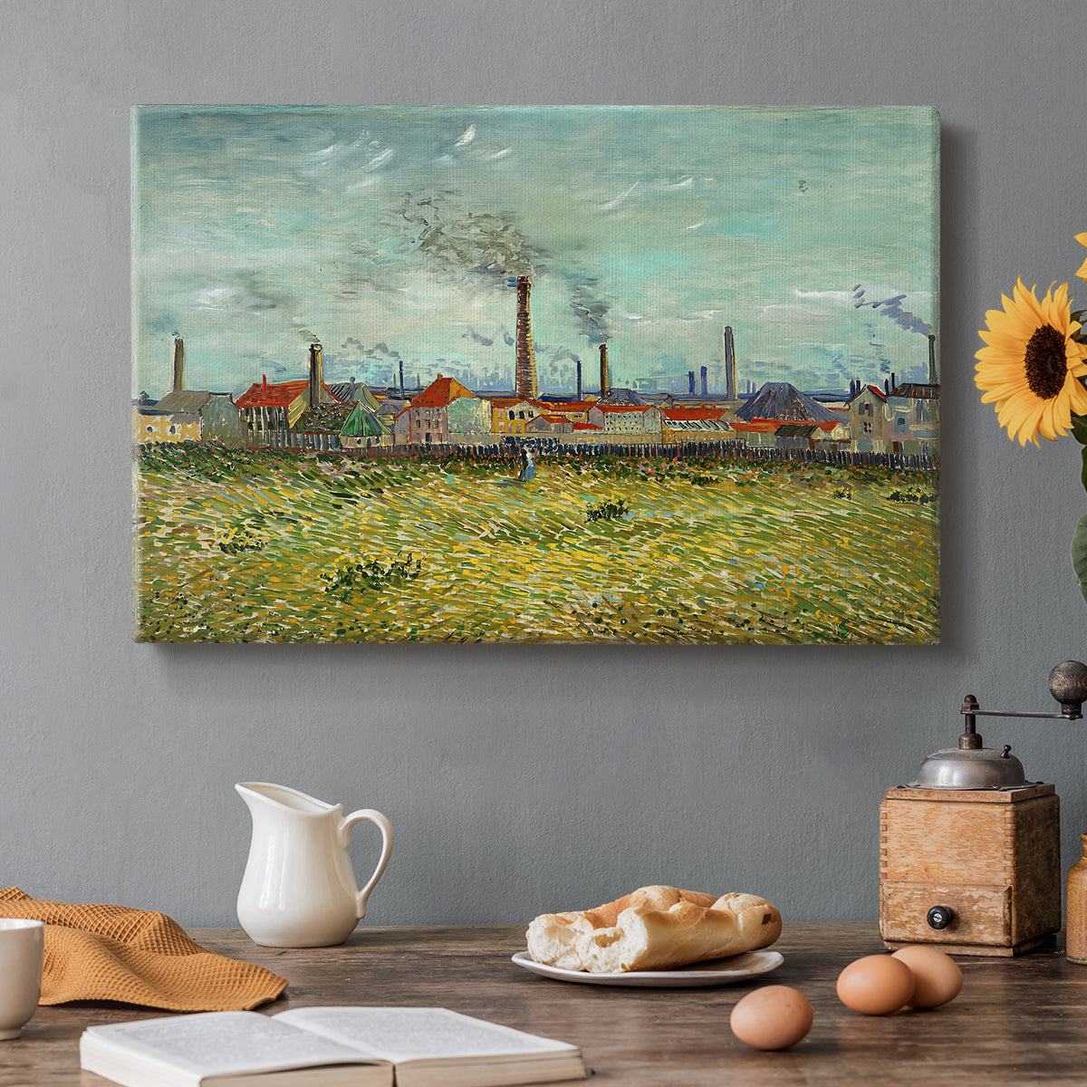 Canvas art print featuring industrial buildings with smokestacks rising above flat landscape, set in a cozy kitchen setting