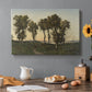 Canvas art print featuring trees silhouetted against evening sky in warm autumn tones, set in a cozy kitchen setting
