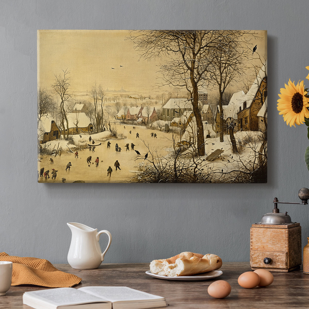 Canvas art print featuring a village scene with skaters on frozen river, set in a cozy kitchen setting