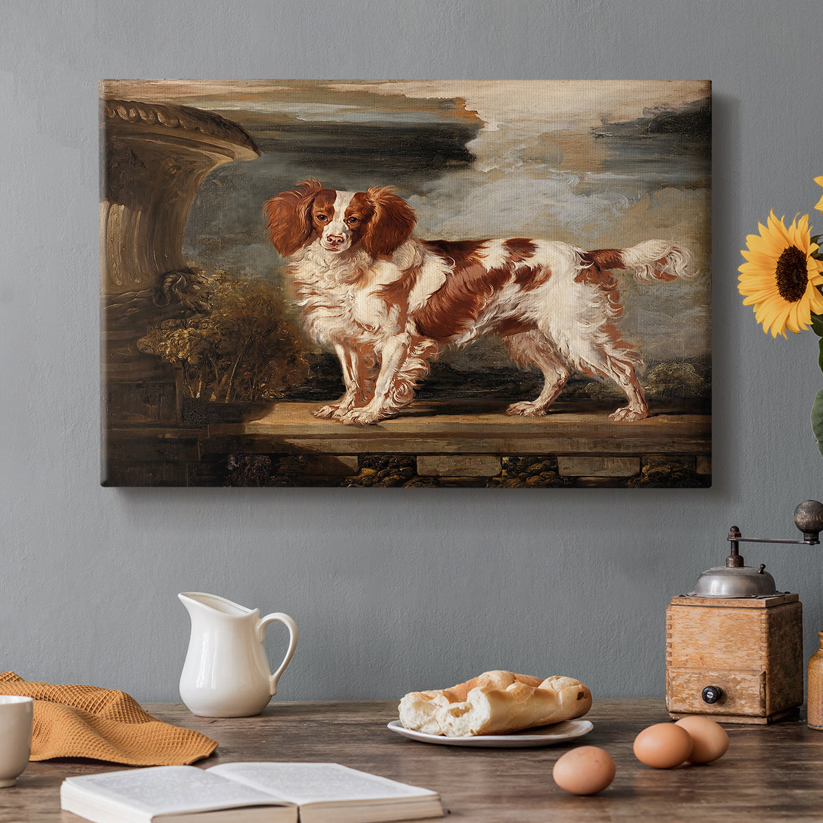 Canvas art print featuring a spaniel dog resting in landscape with attentive expression, set in a cozy kitchen setting