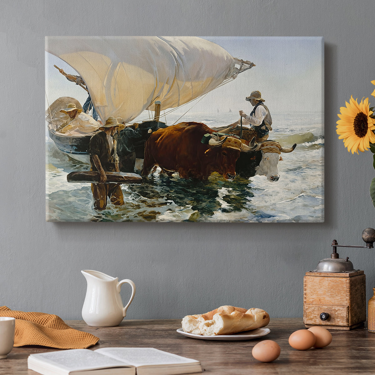 Canvas art print featuring fishermen pulling boat ashore with oxen along beach, set in a cozy kitchen setting