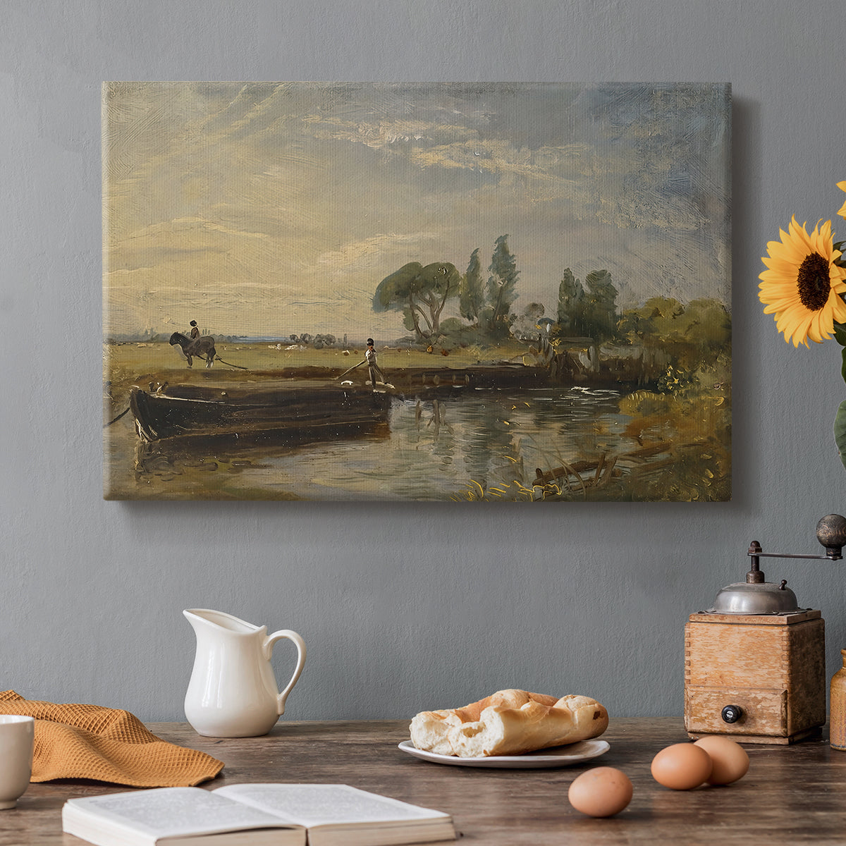 Canvas art print featuring a barge floating on river near lock with greenery, set in a cozy kitchen setting