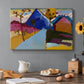 Canvas art print featuring a simplified street scene with buildings and landscape rendered in bold color blocks, set in a cozy kitchen setting