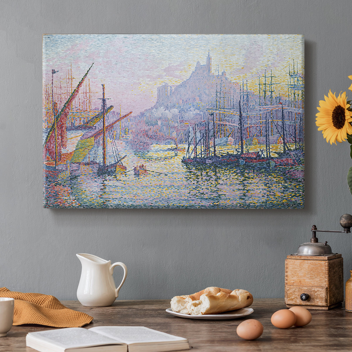 Canvas art print featuring a busy harbor filled with boats and waterfront, set in a cozy kitchen setting