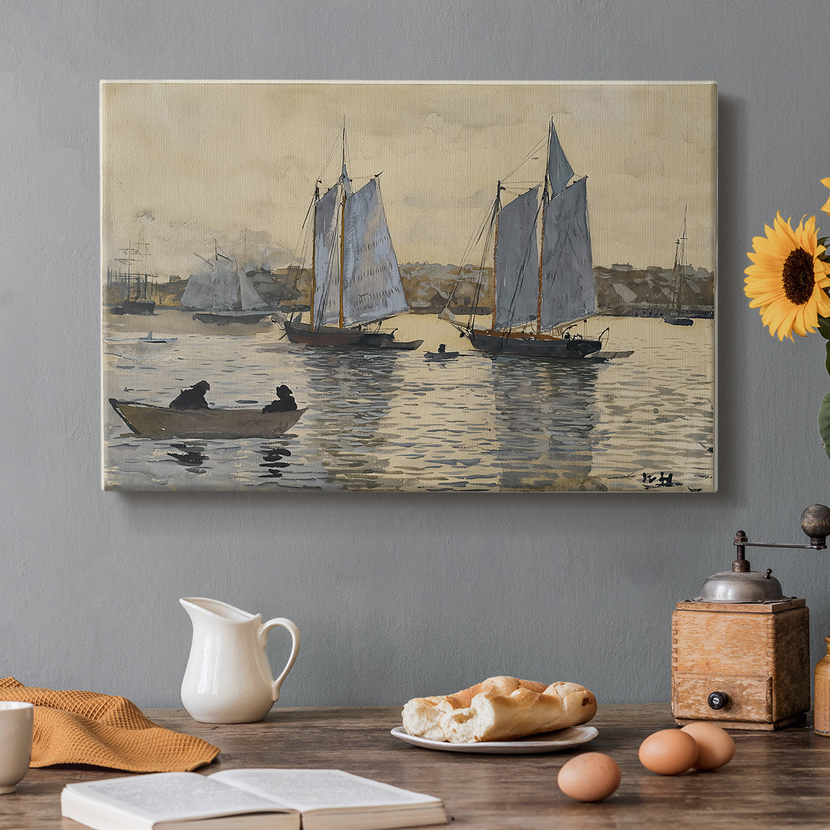 Canvas art print featuring two sailing ships positioned side by side on calm water, set in a cozy kitchen setting