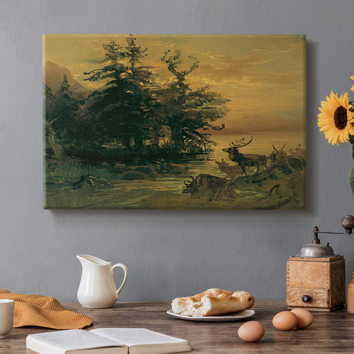 Canvas art print featuring deer near lakeshore with mountains behind, set in a cozy kitchen setting