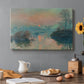 Canvas art print featuring a glowing sunset over snowy river landscape with soft reflections, set in a cozy kitchen setting