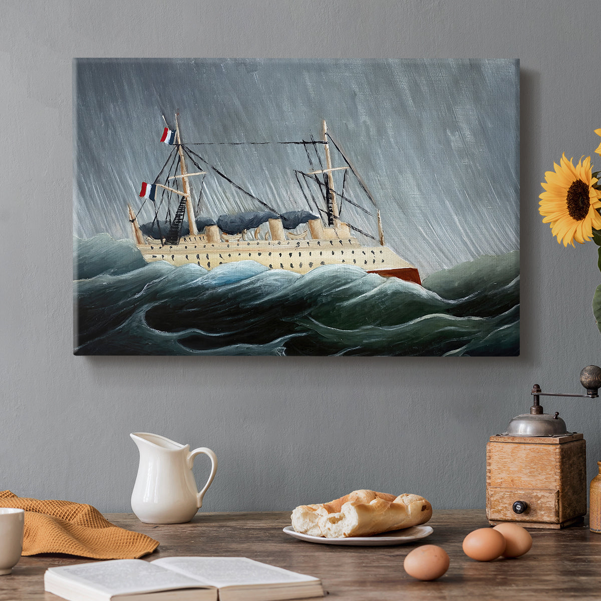 Canvas art print featuring a sailing ship tossed by large waves under dark stormy sky, set in a cozy kitchen setting