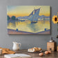 Canvas art print featuring a harbor glowing at sunset with boats in water, set in a cozy kitchen setting