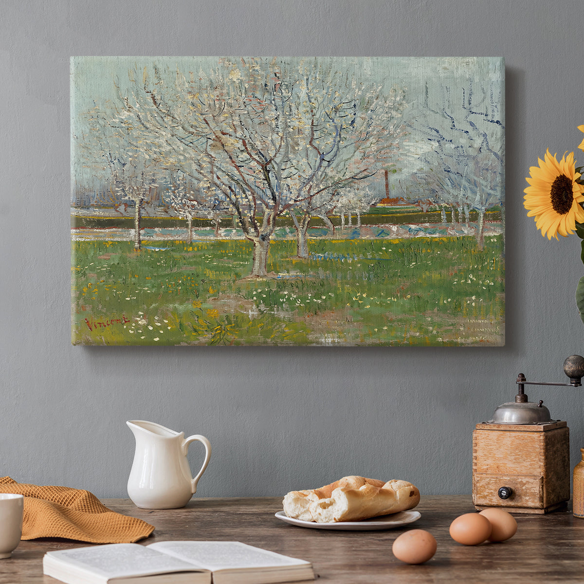 Canvas art print featuring evenly spaced trees covered in blossoms across flat orchard landscape, set in a cozy kitchen setting